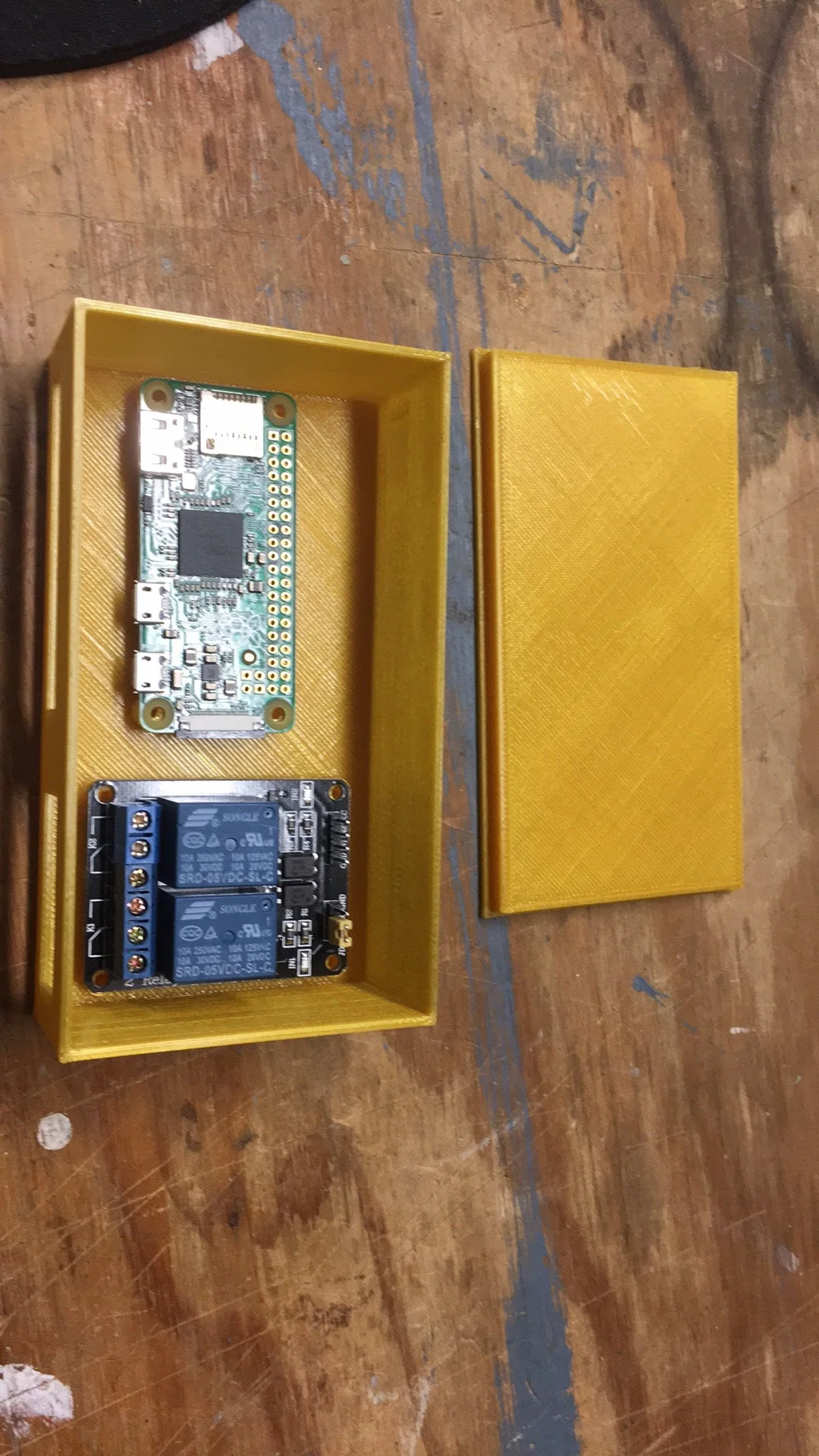 Yellow custom electronics enclosure with internal control board