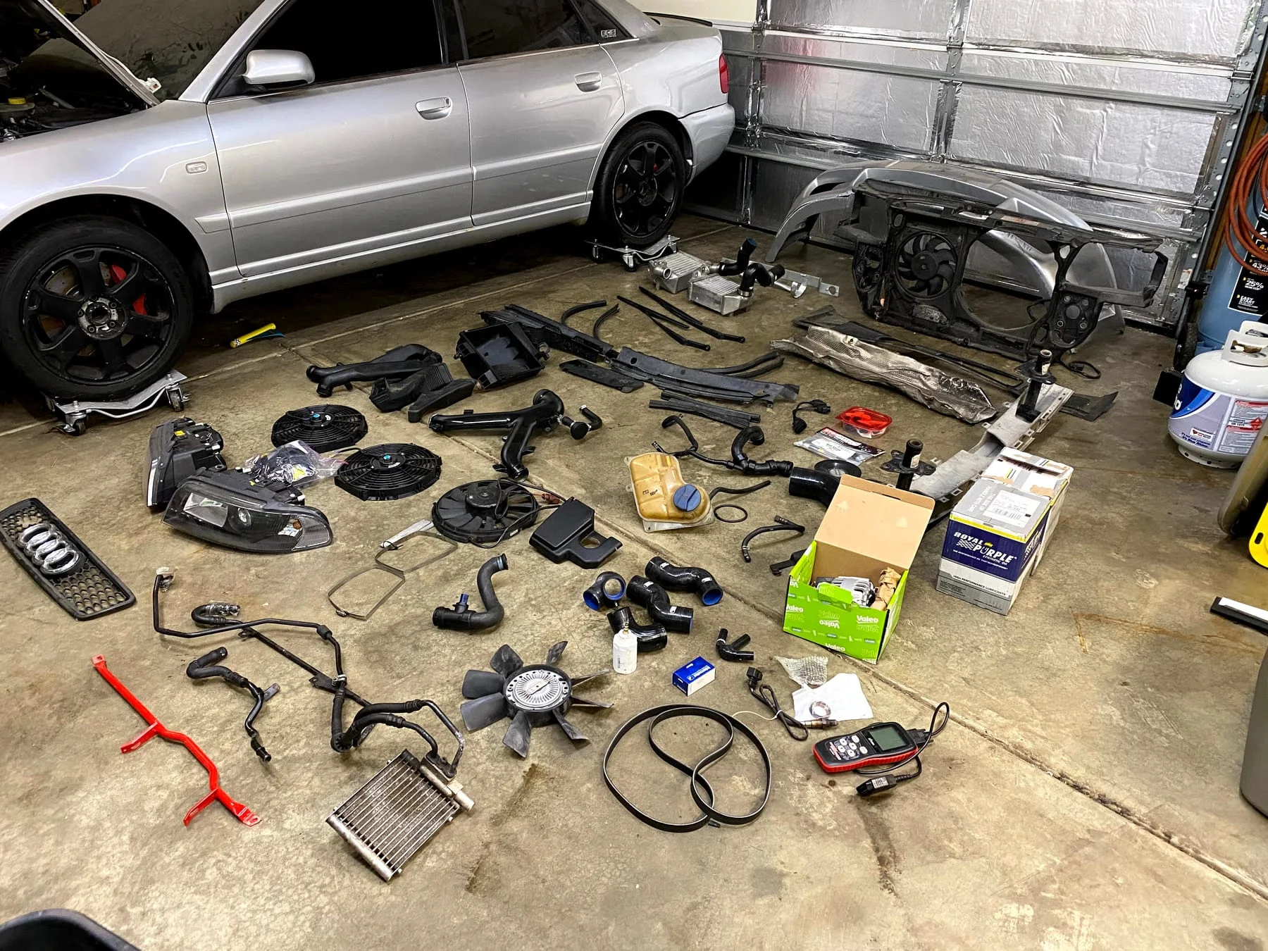 B5 S4 components arranged across the workshop floor for inspection